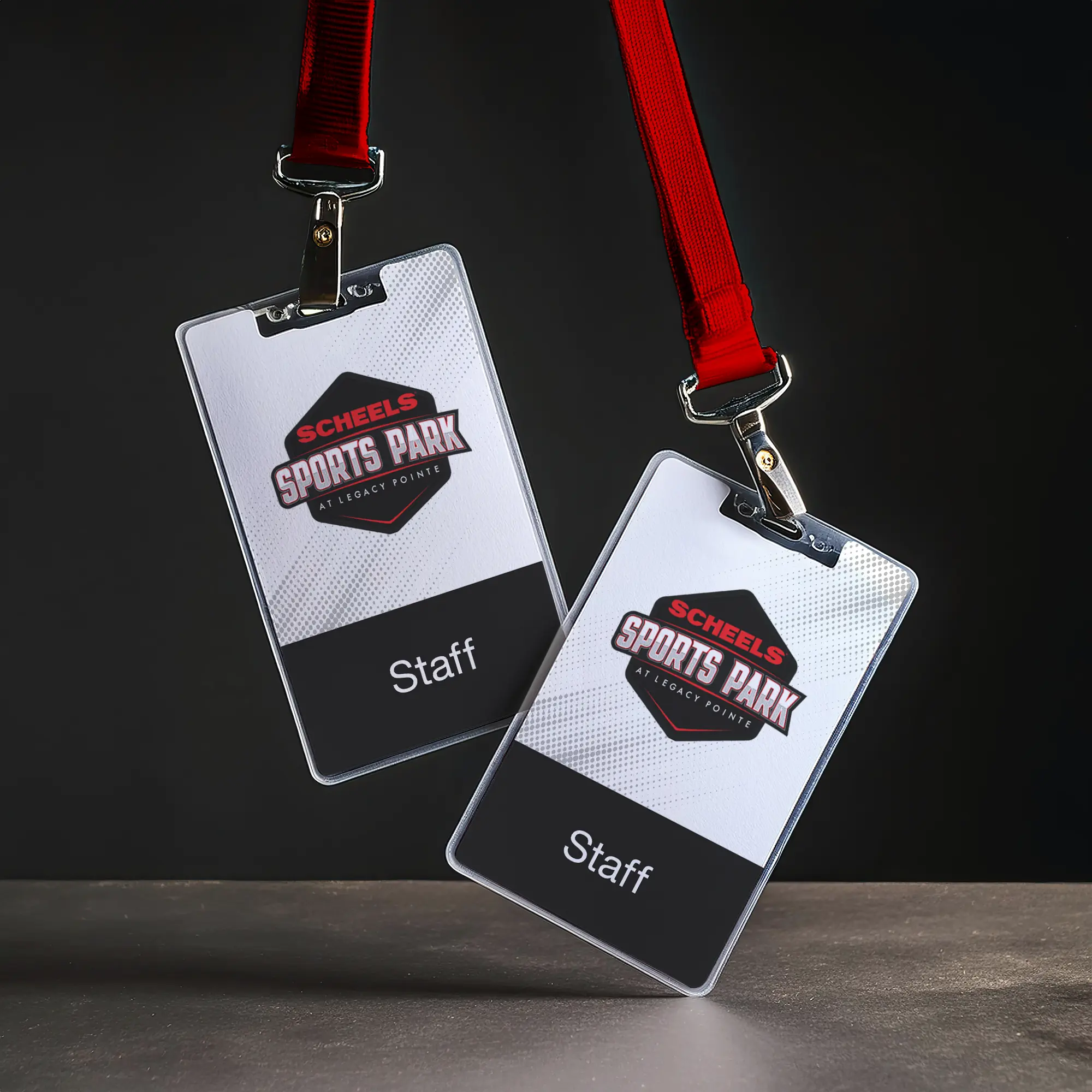 Lanyards labeled 'Scheels Staff'